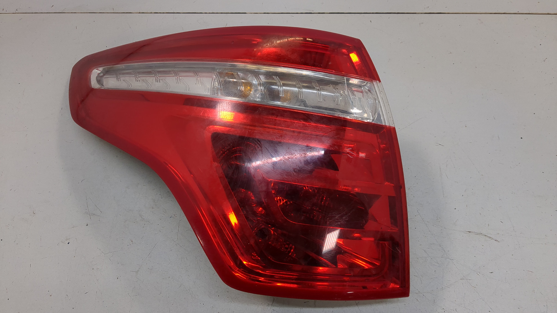 Фонарь задний левый