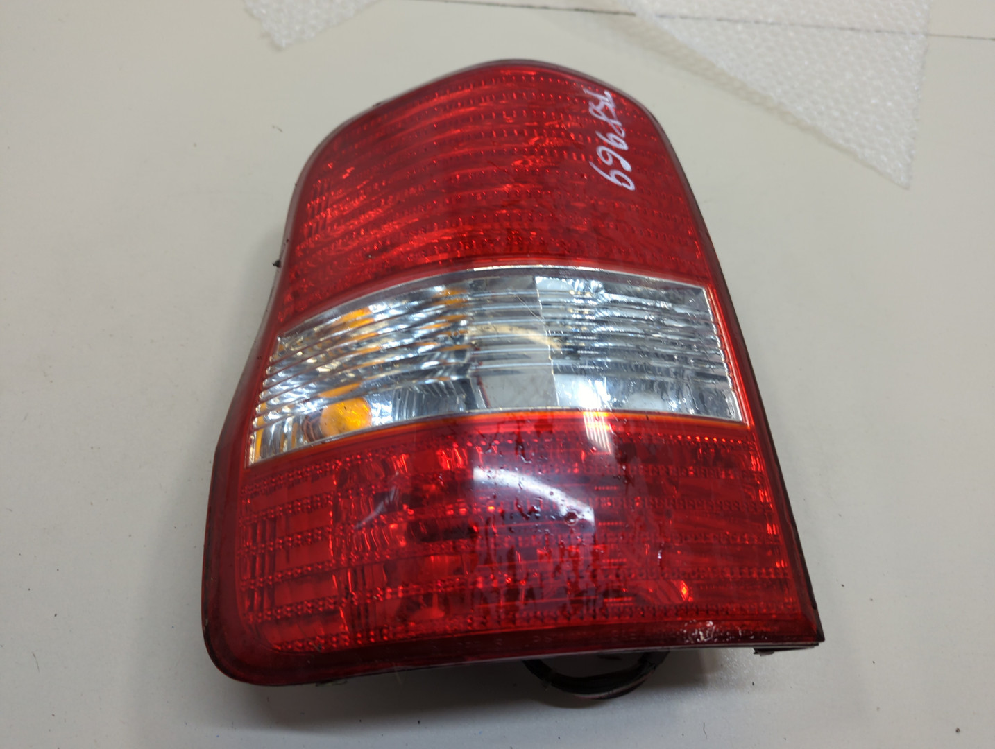 Фонарь задний левый