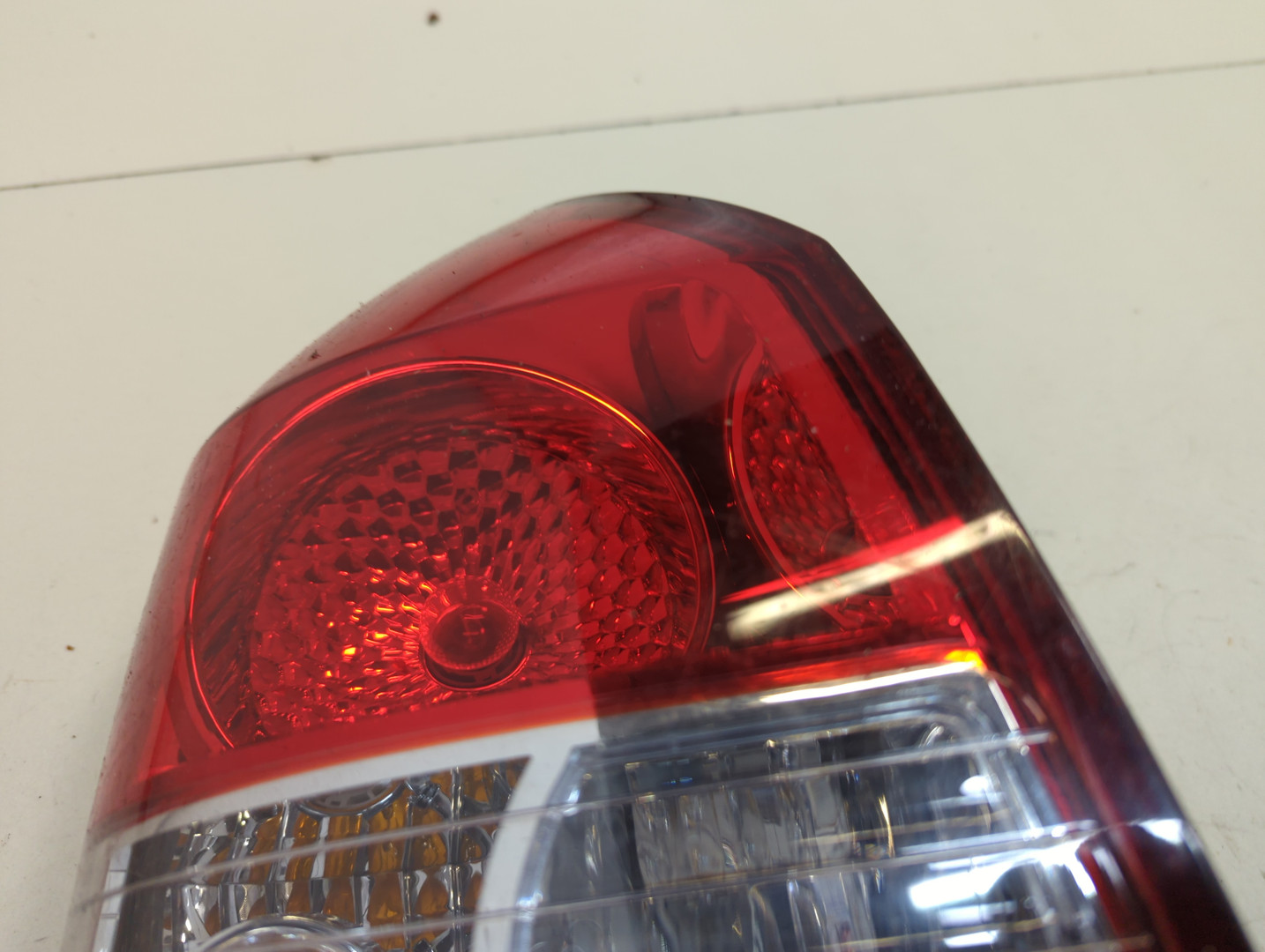 Фонарь задний левый