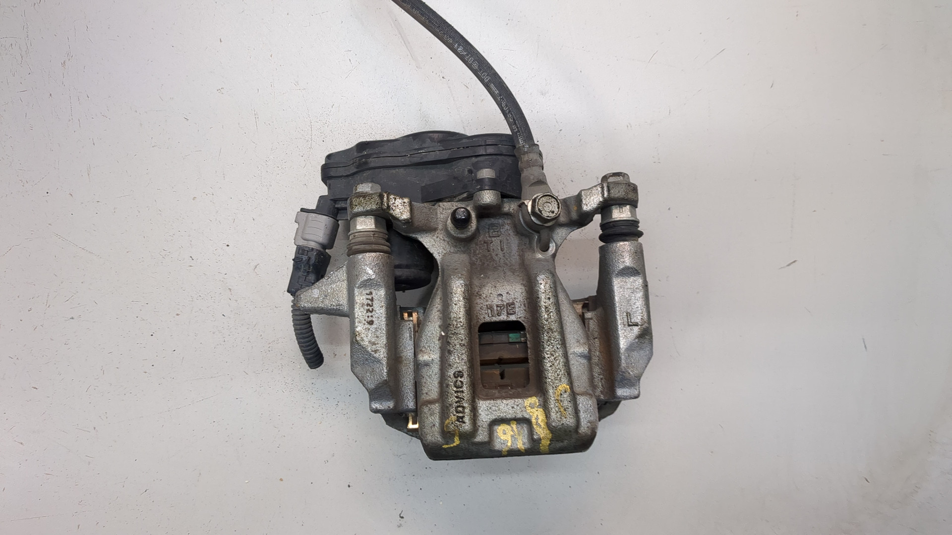 Суппорт задний левый