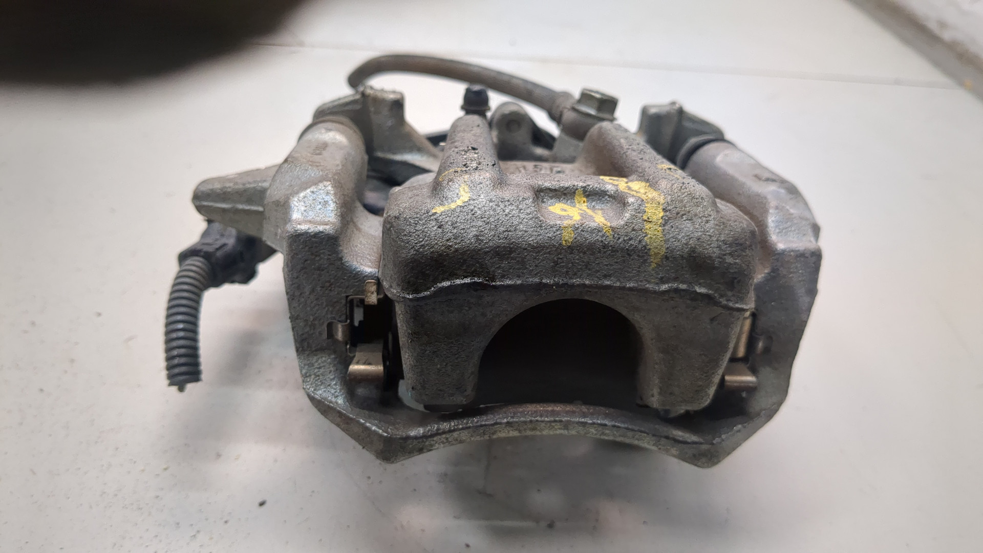 Суппорт задний левый