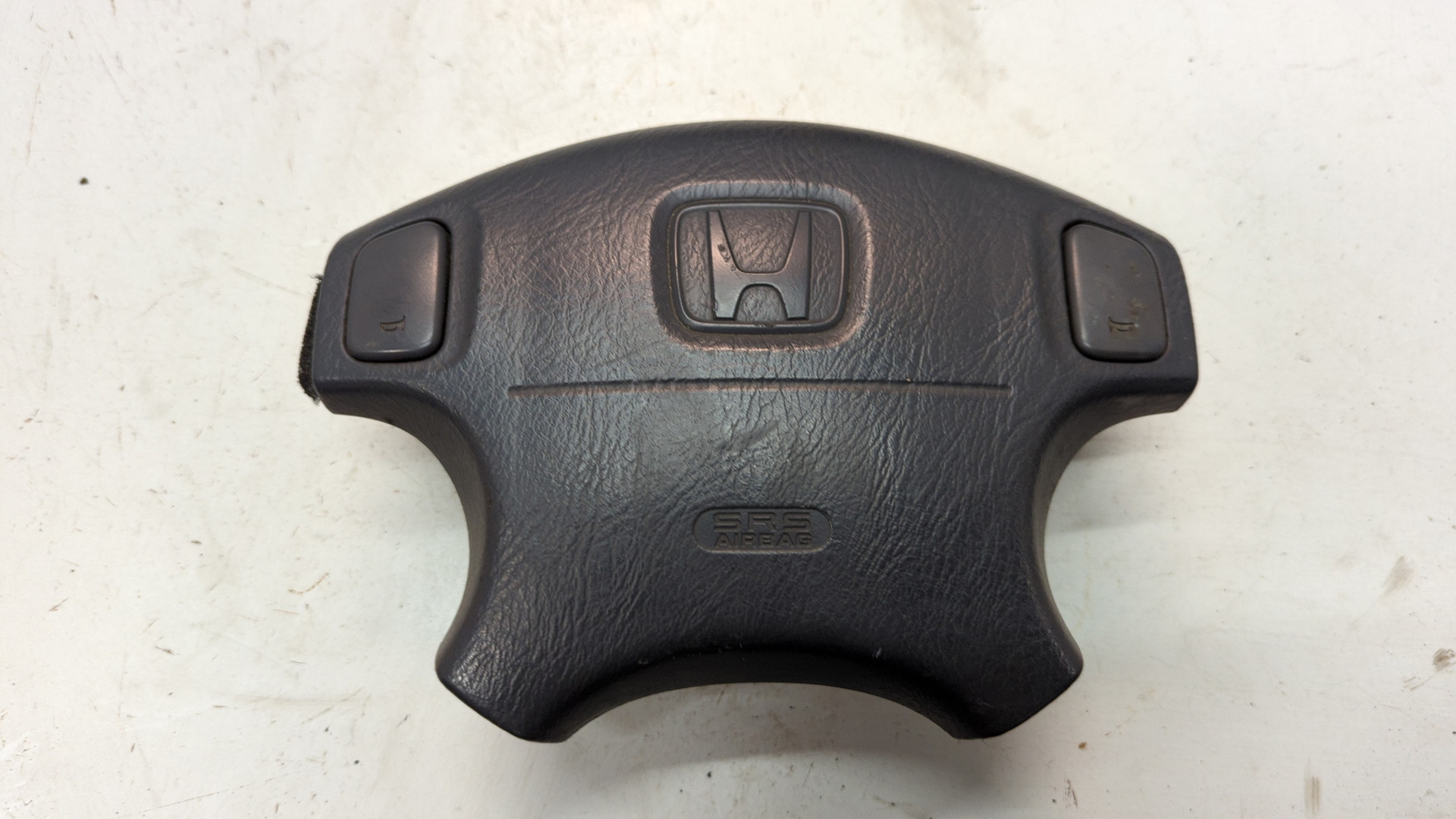 Подушка безопасности в рулевое колесо