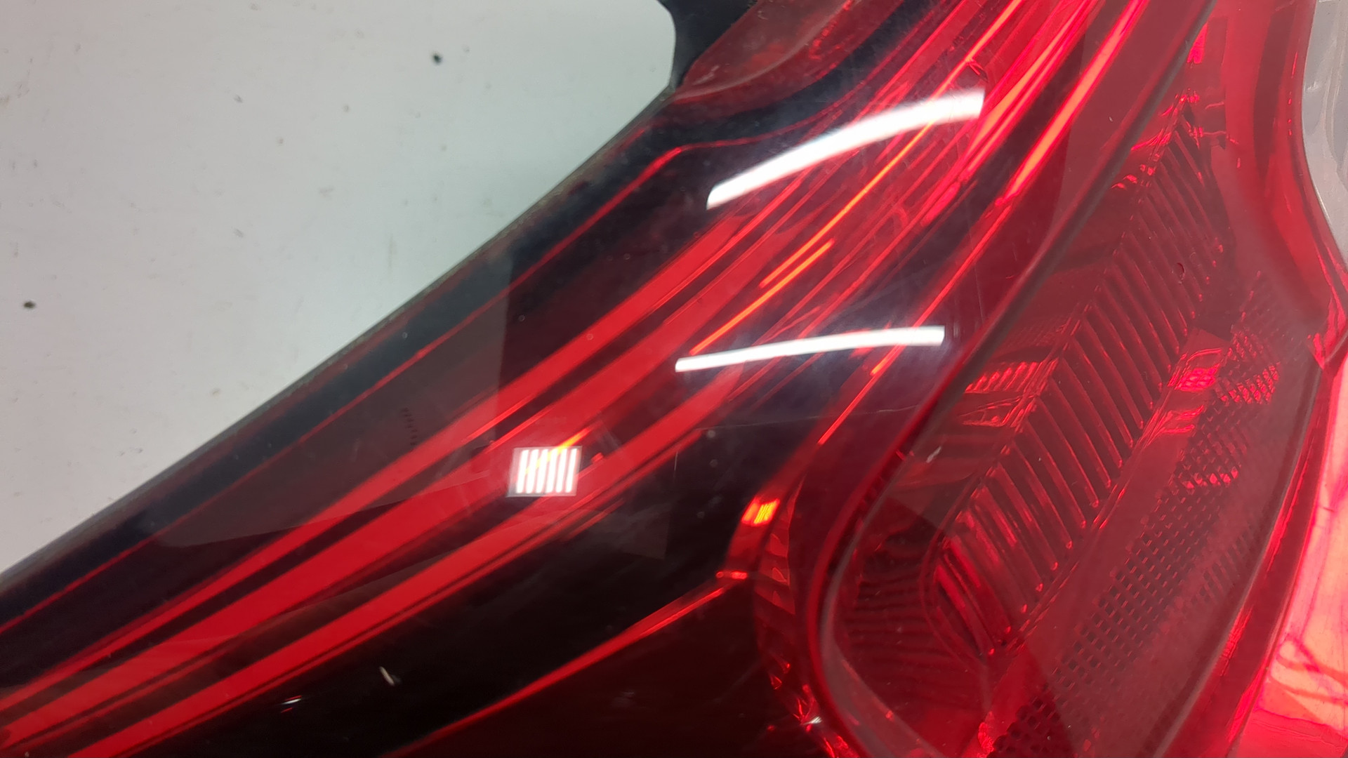 Фонарь задний левый