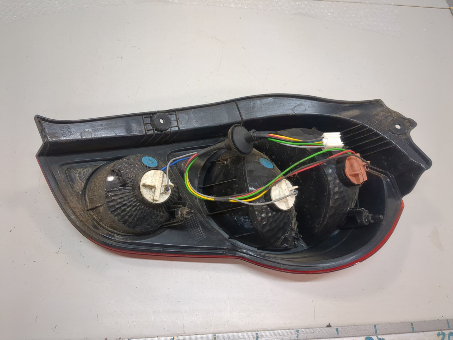 Фонарь задний левый