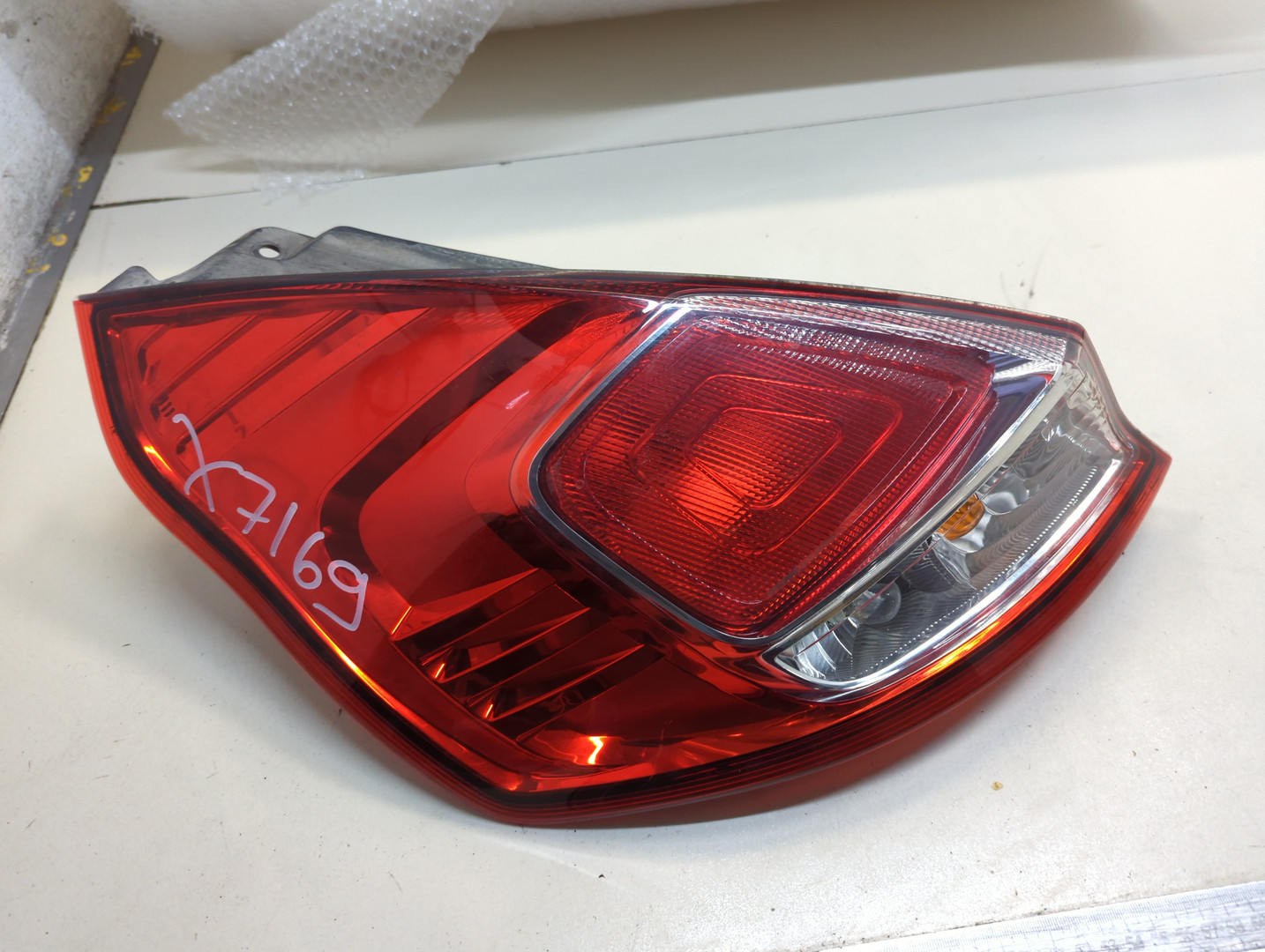 Фонарь задний левый