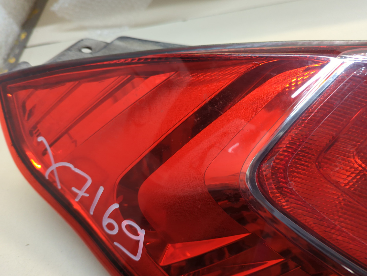 Фонарь задний левый