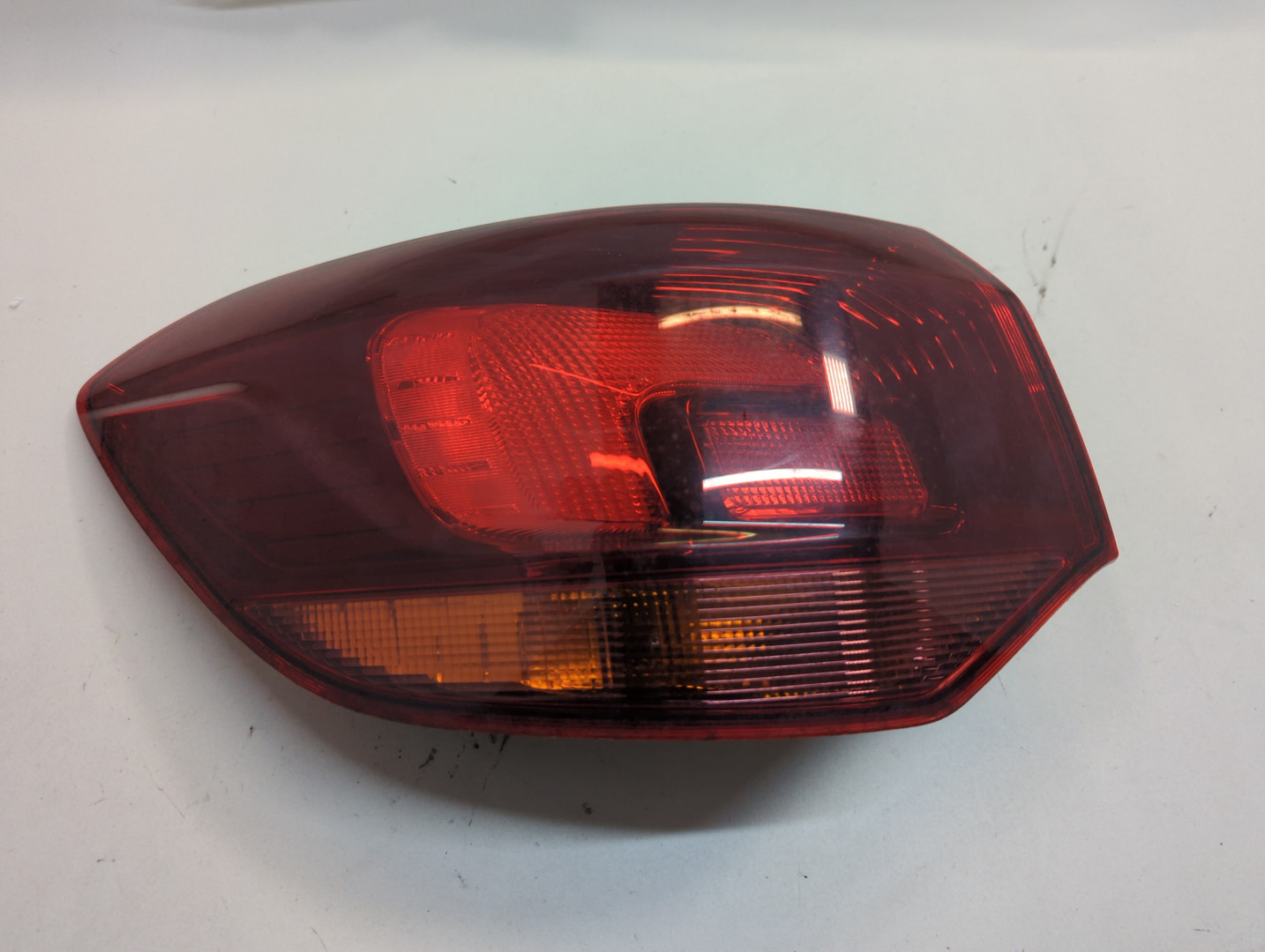 Фонарь задний левый