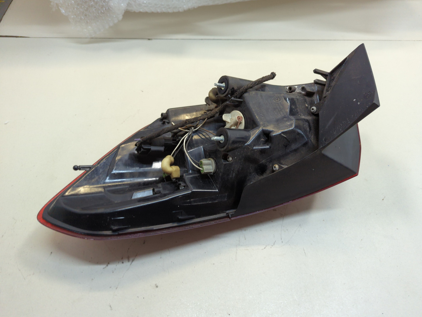 Фонарь задний левый