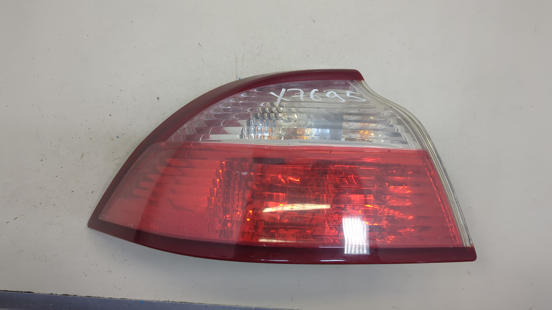 Фонарь задний левый