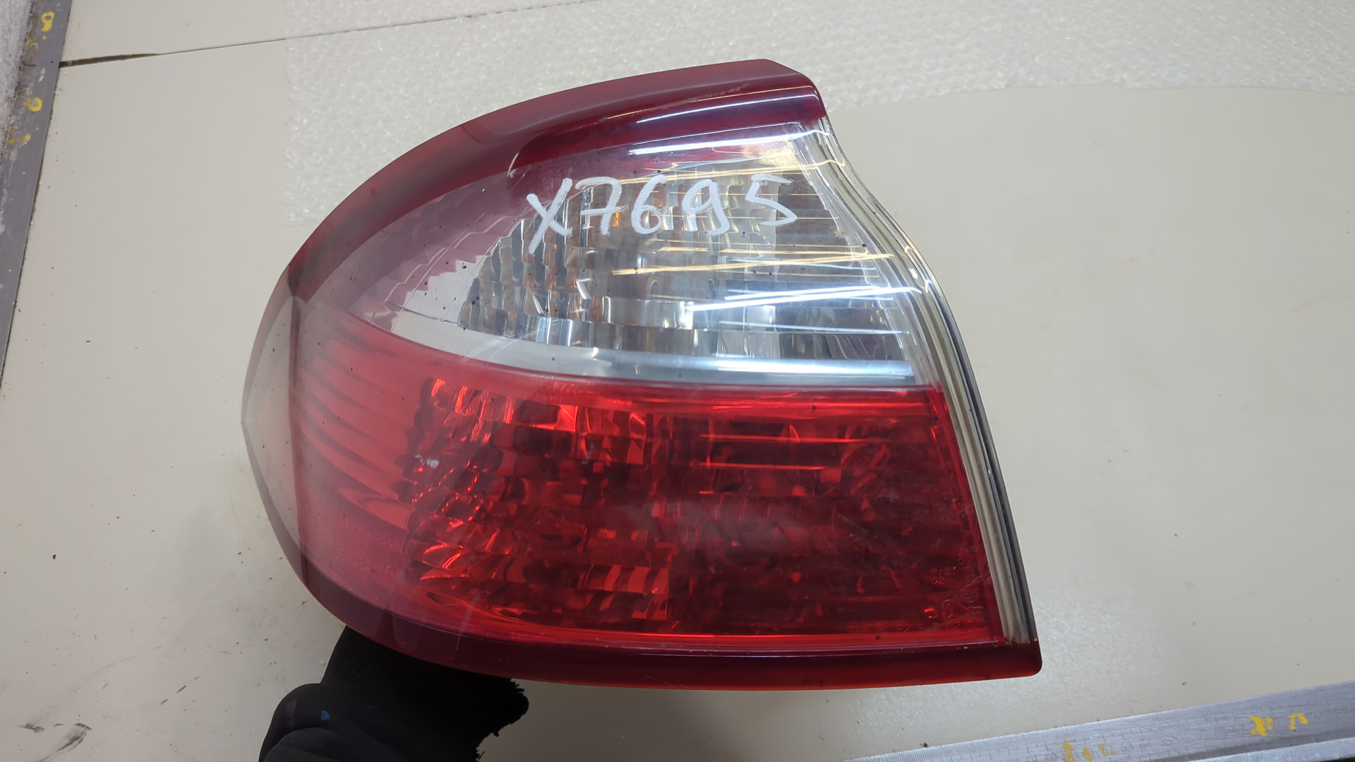 Фонарь задний левый