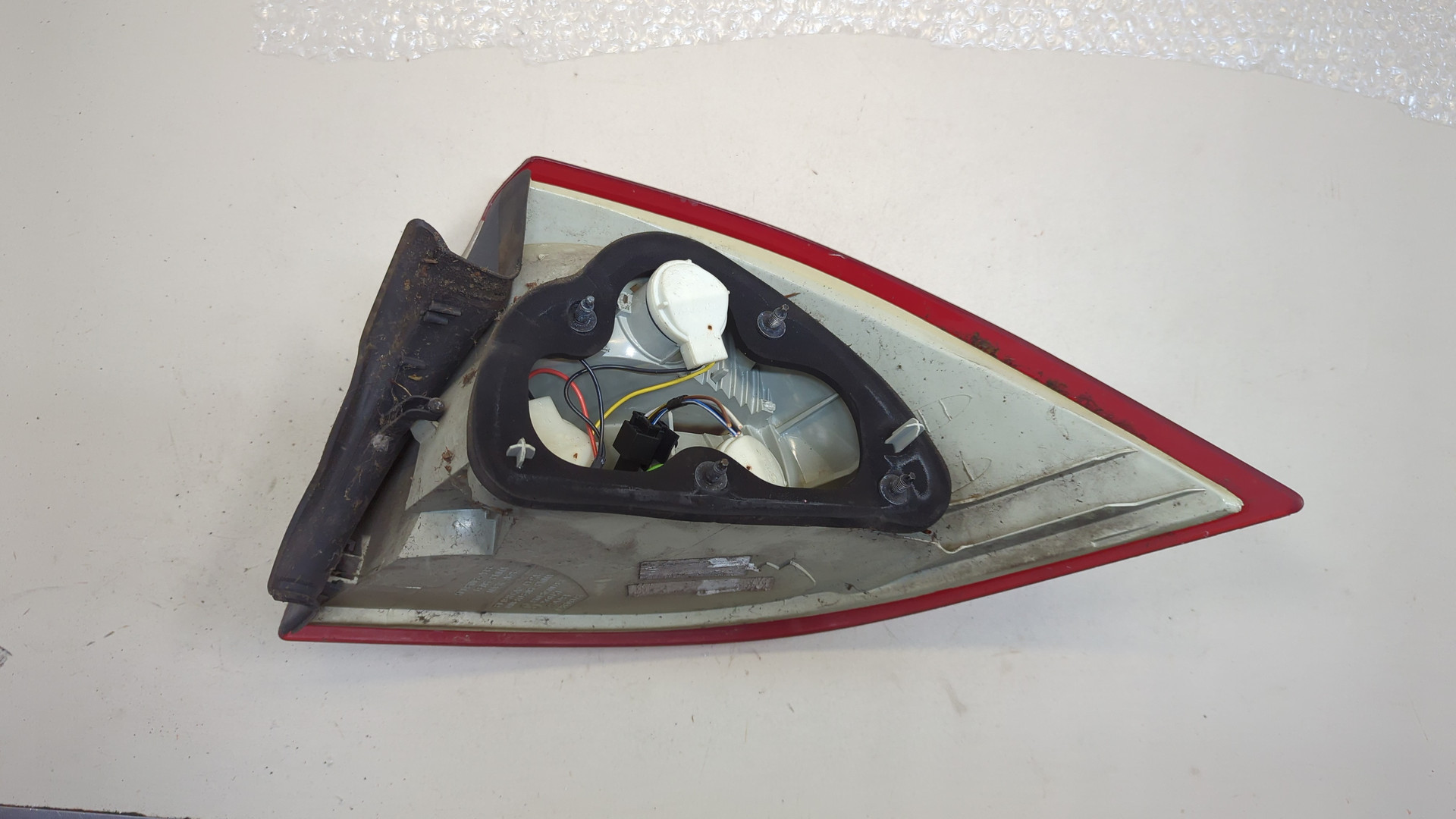 Фонарь задний левый