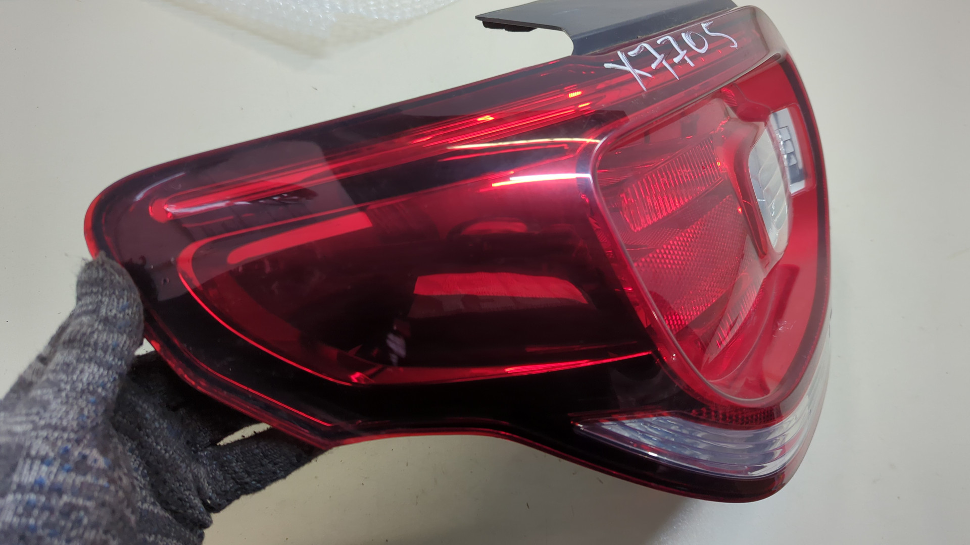 Фонарь задний левый