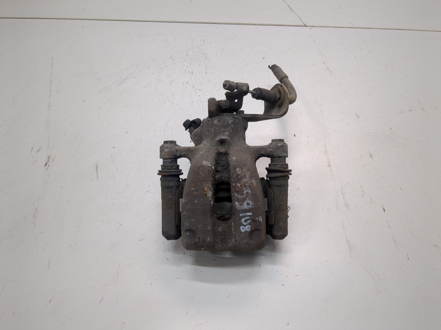 Суппорт задний левый