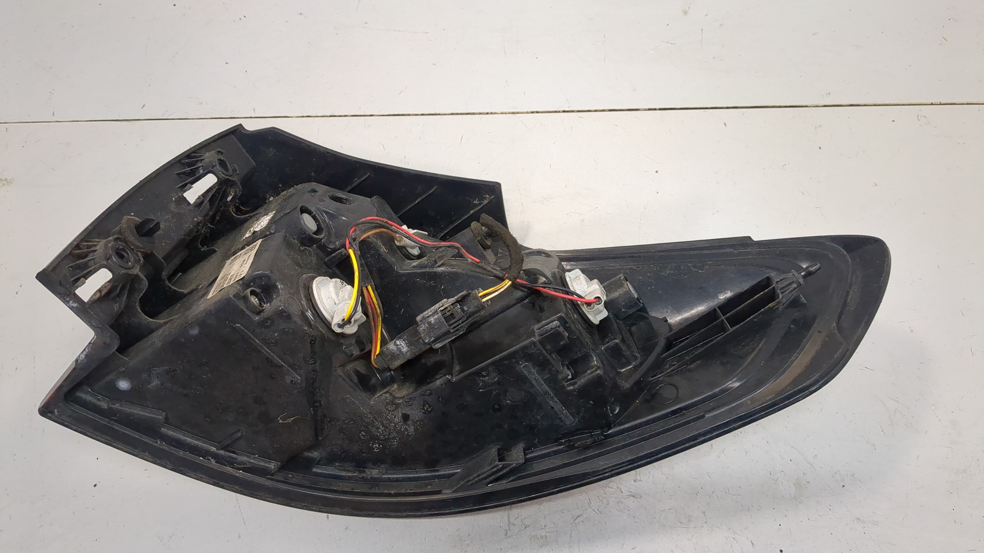 Фонарь задний левый