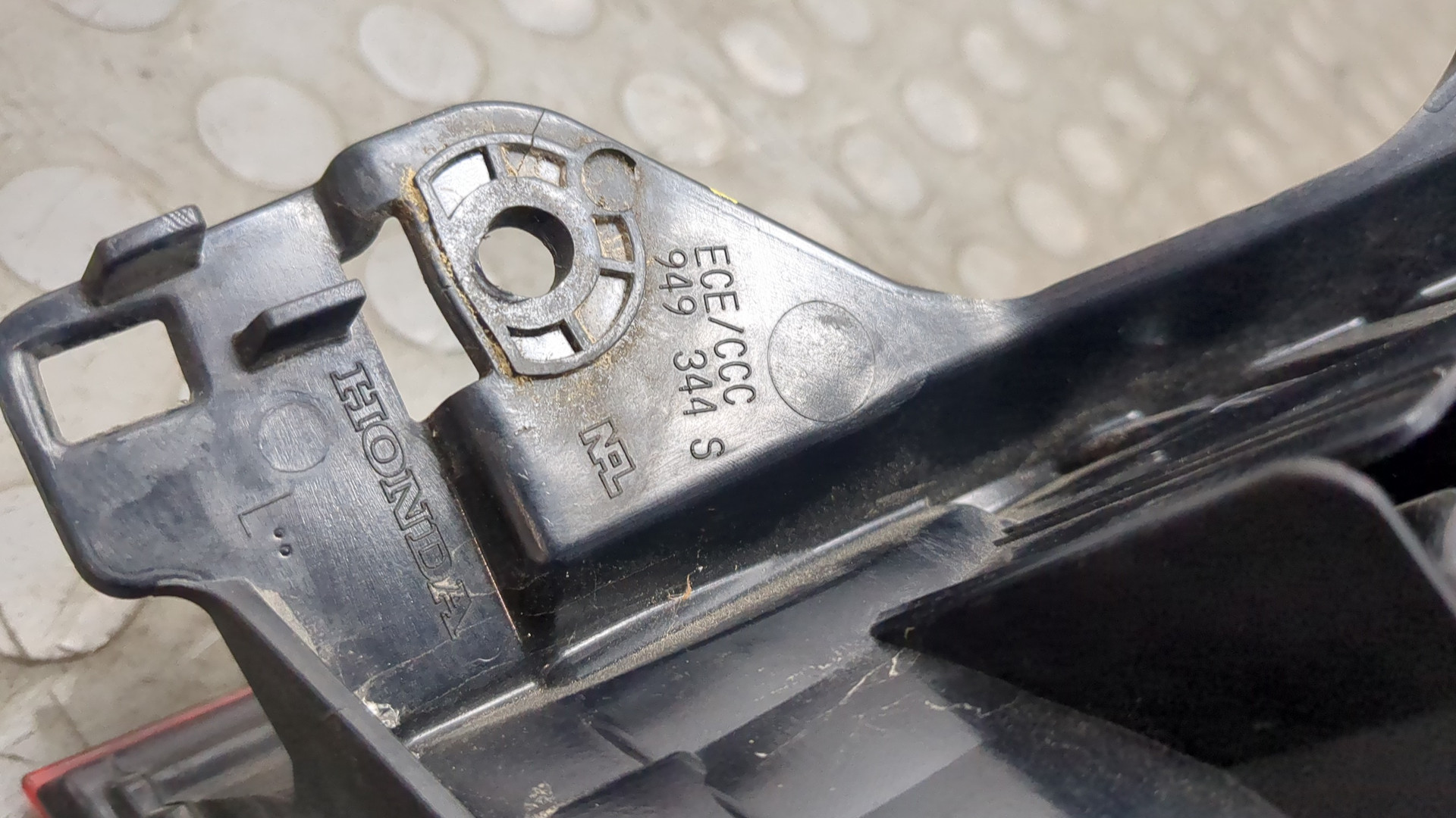 Фонарь задний левый