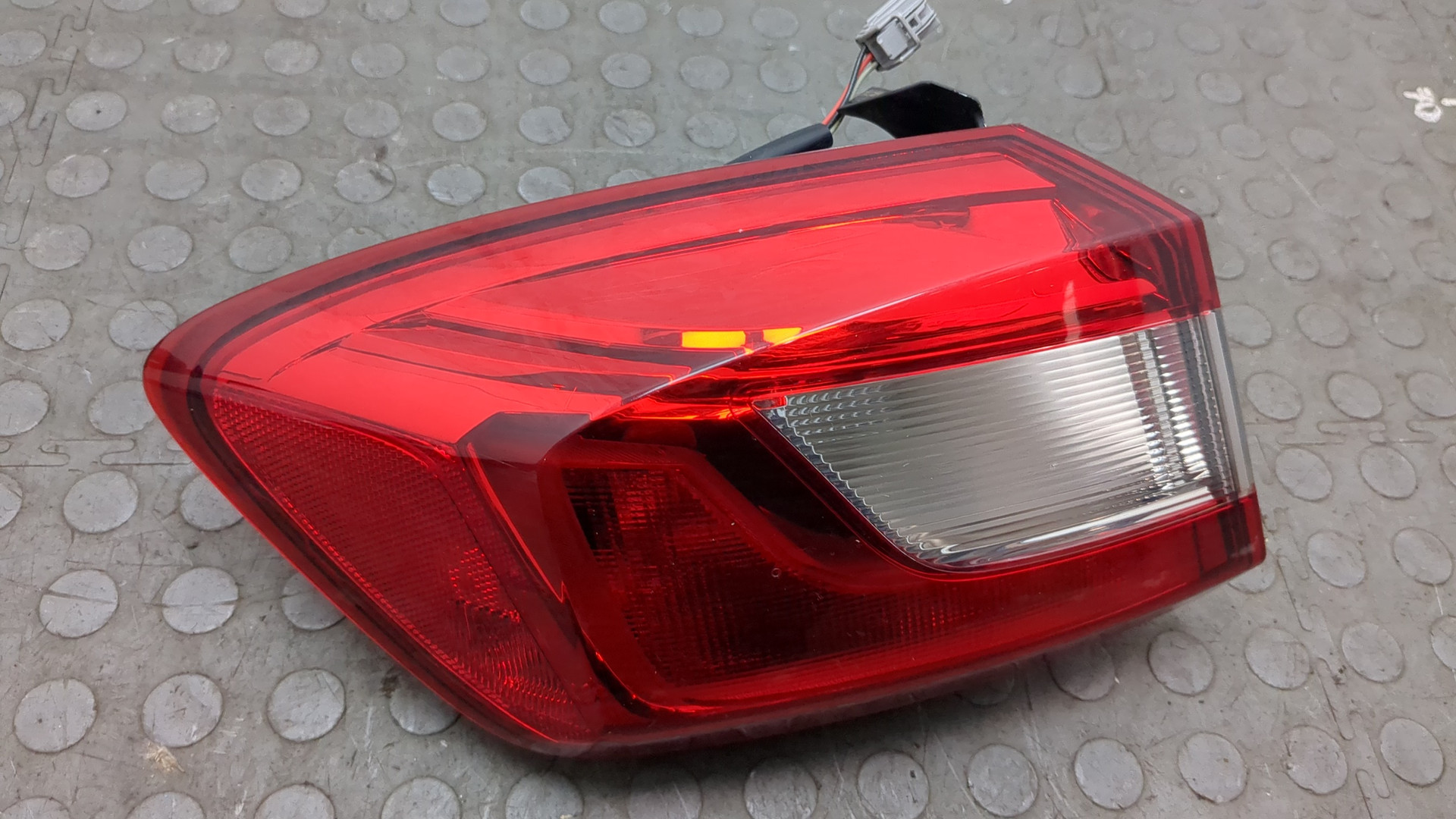 Фонарь задний левый