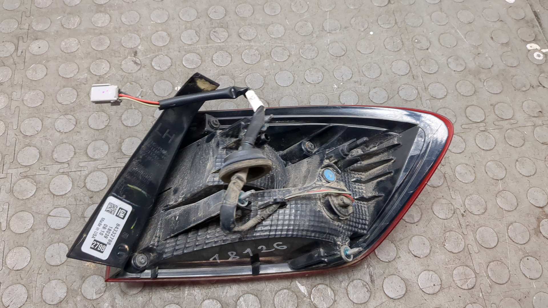 Фонарь задний левый