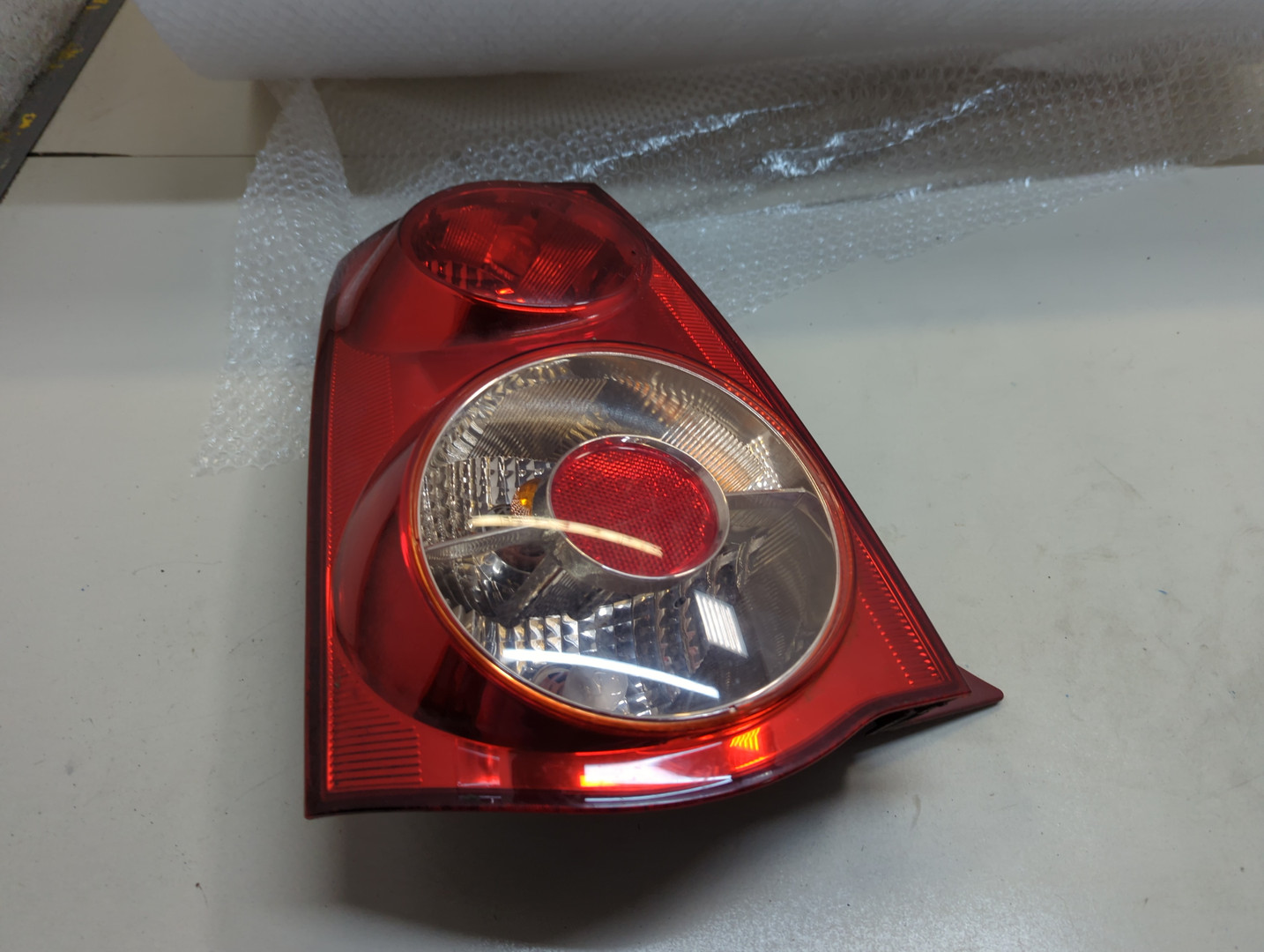 Фонарь задний левый