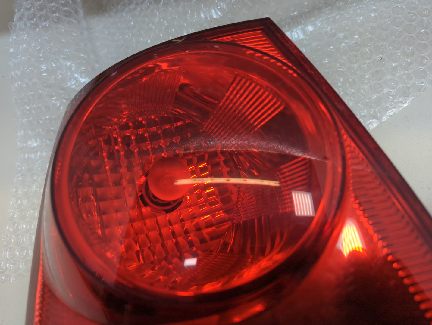 Фонарь задний левый