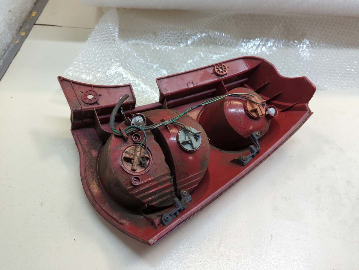 Фонарь задний левый