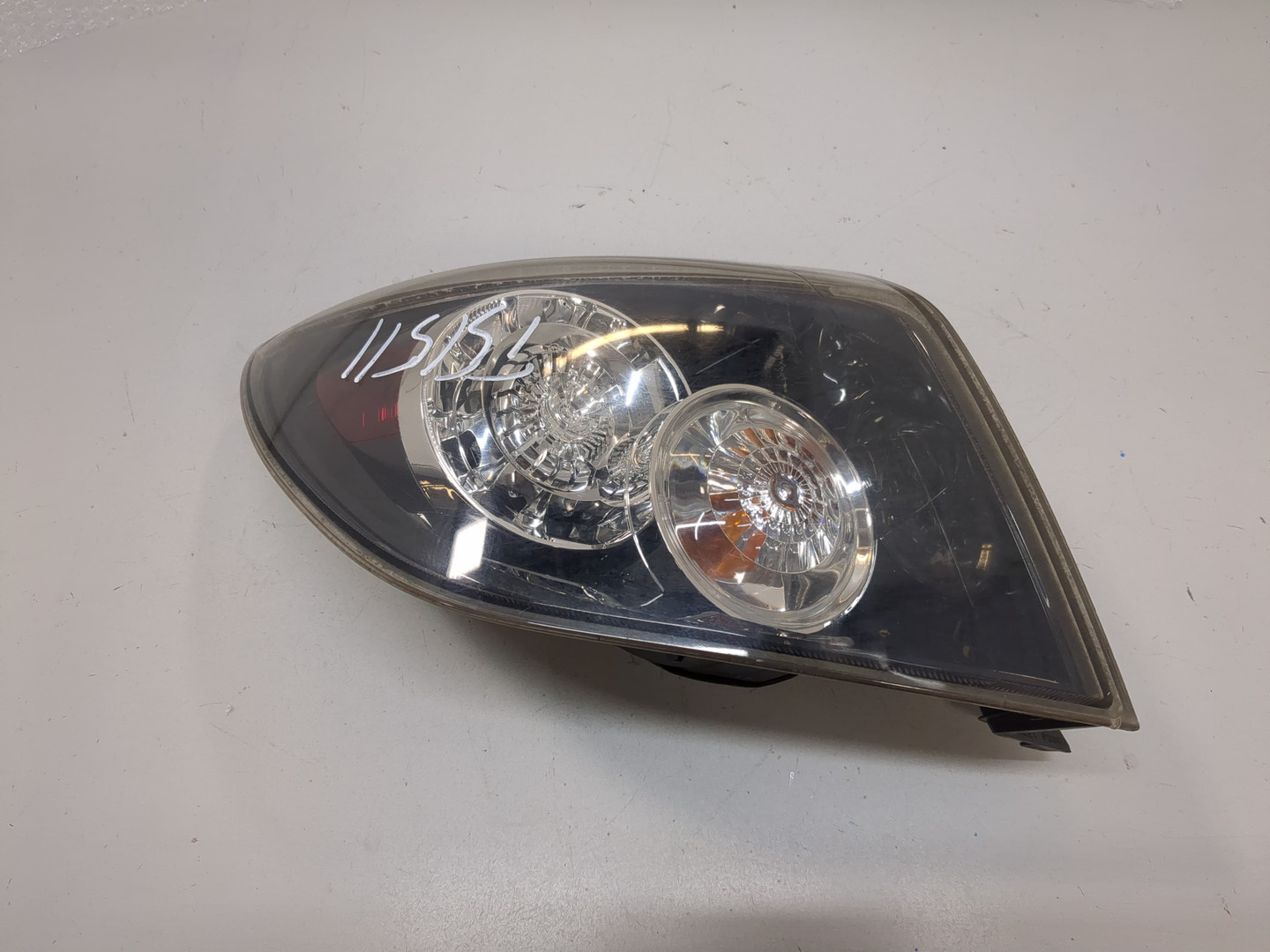 Фонарь задний левый