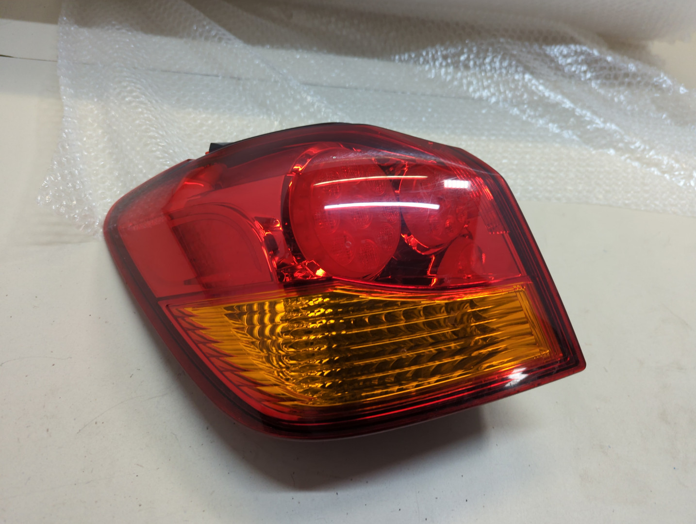 Фонарь задний левый