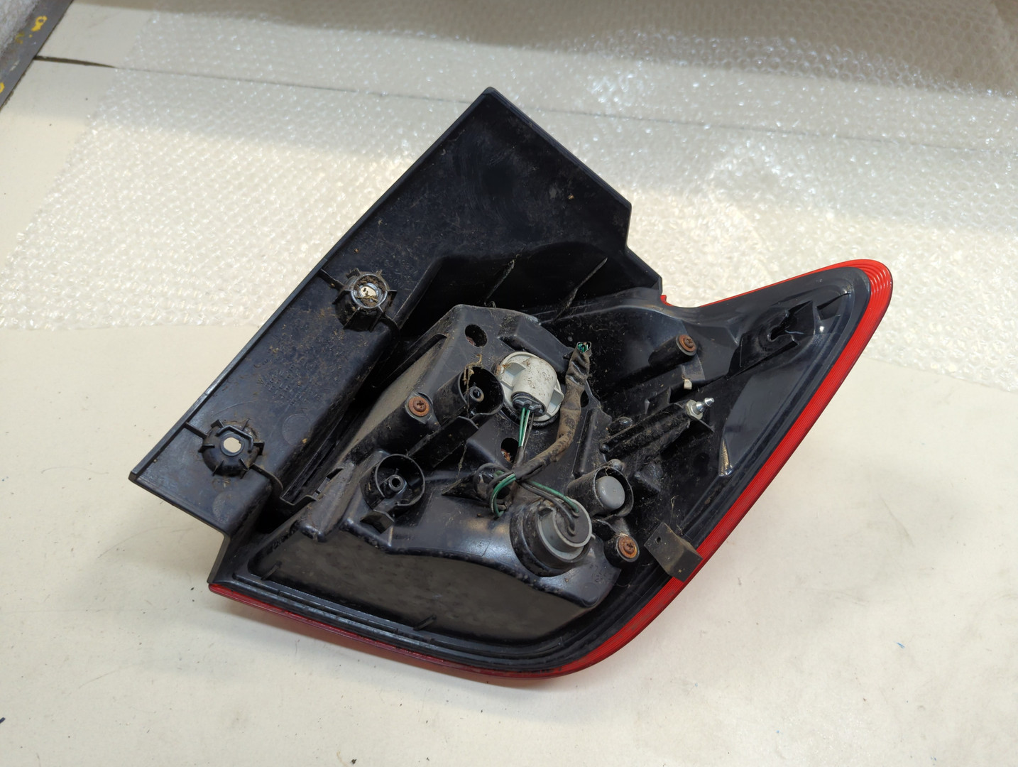 Фонарь задний левый