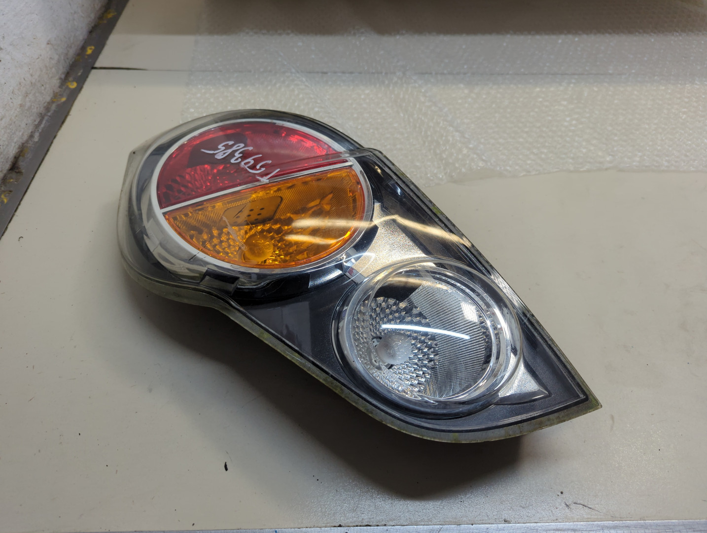 Фонарь задний левый