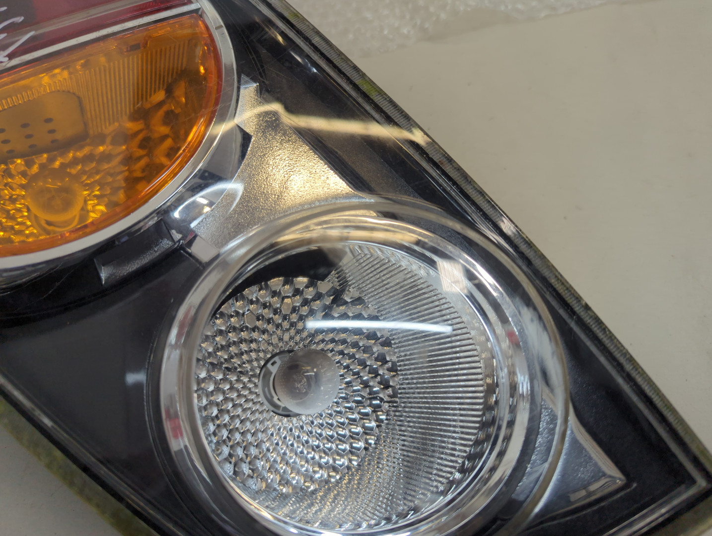 Фонарь задний левый