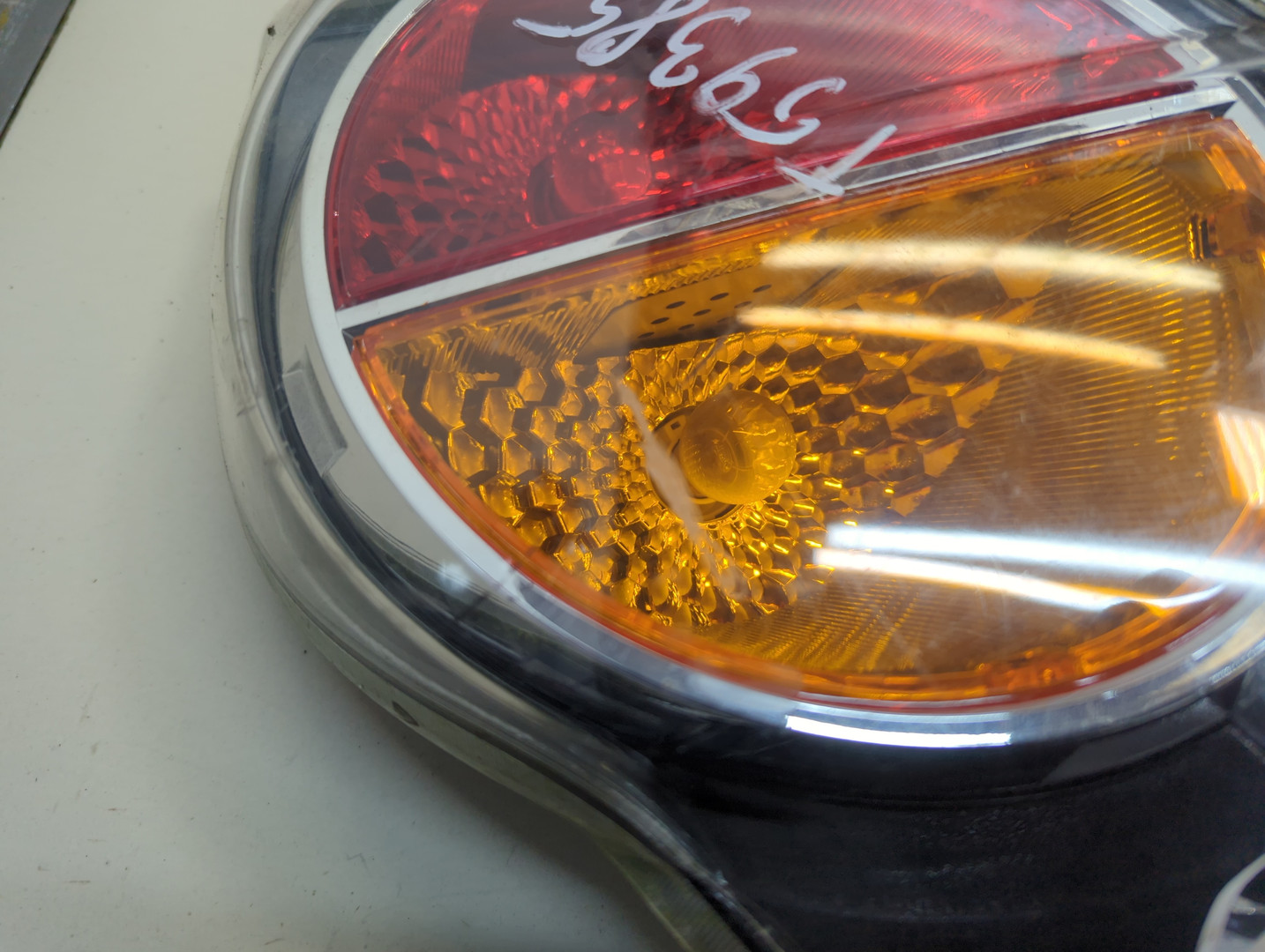 Фонарь задний левый