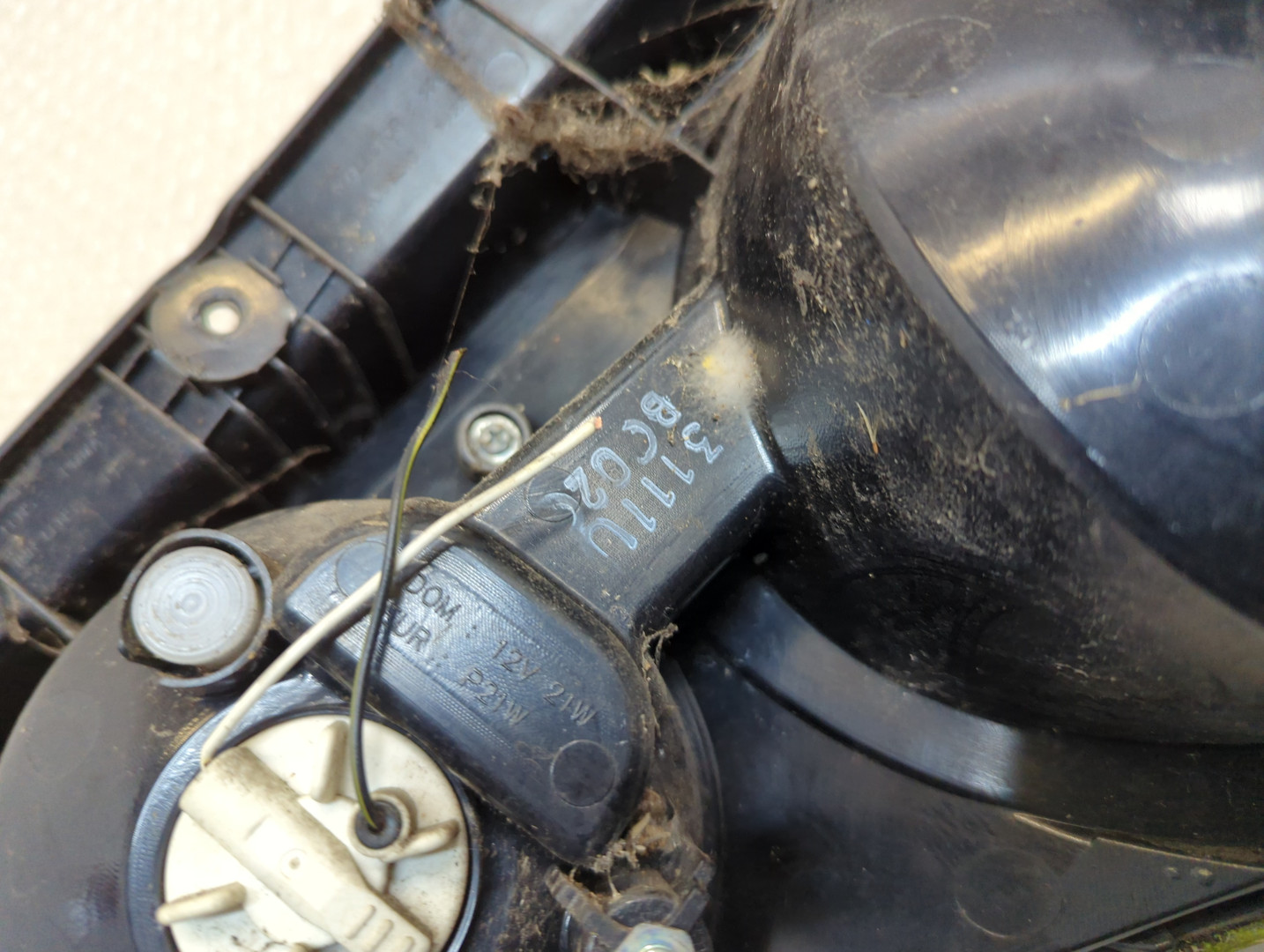 Фонарь задний левый