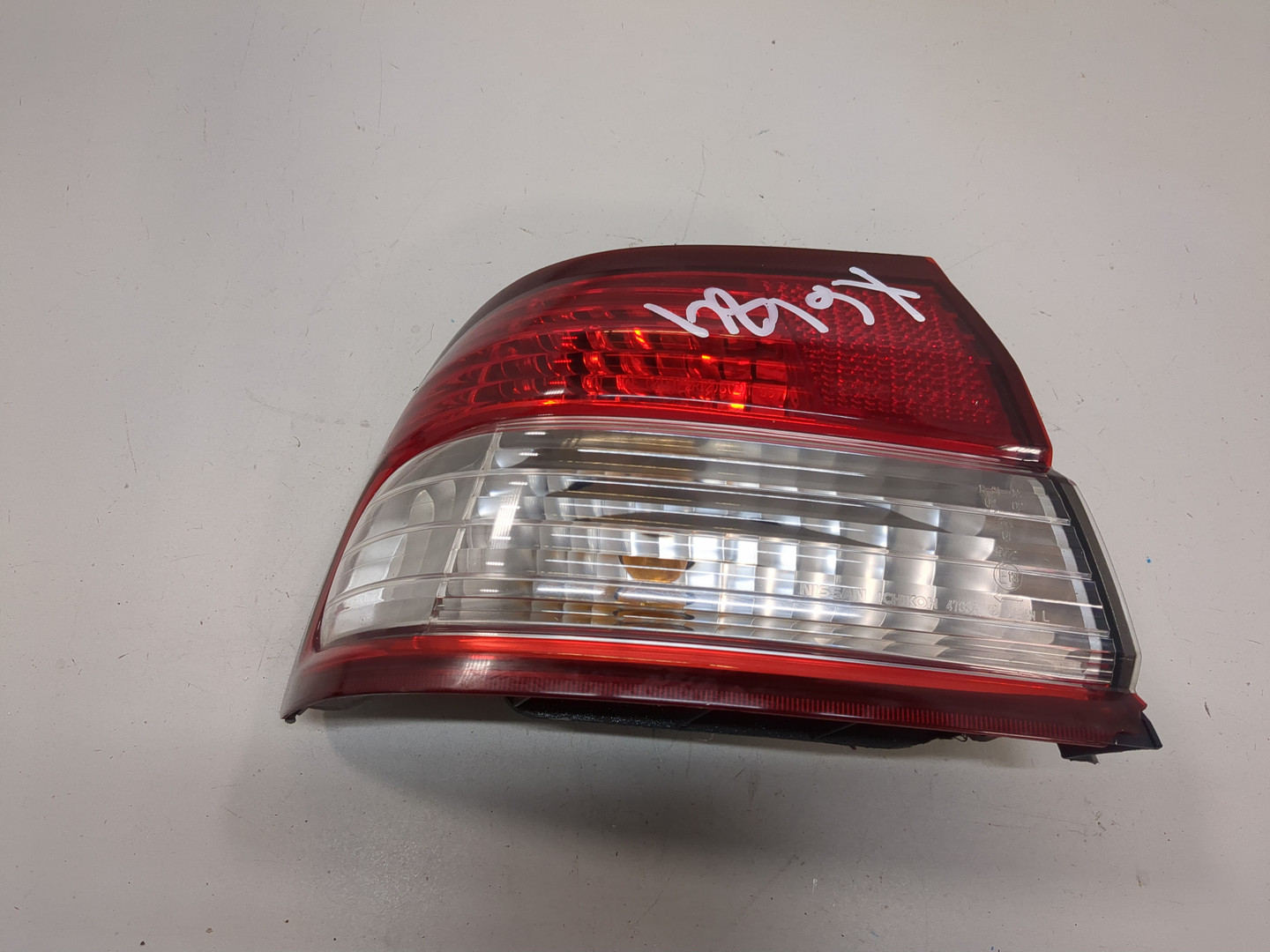 Фонарь задний левый