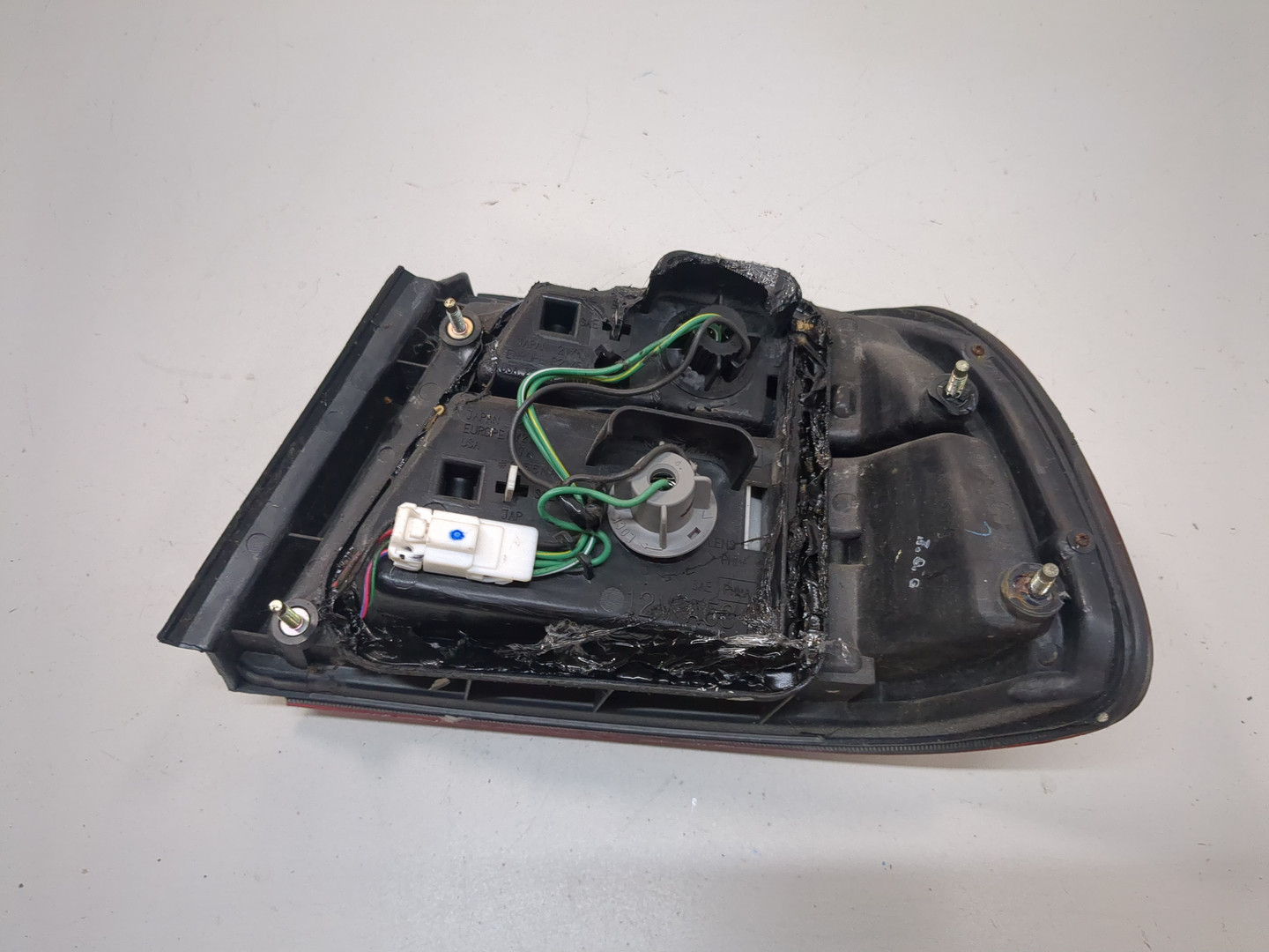 Фонарь задний левый