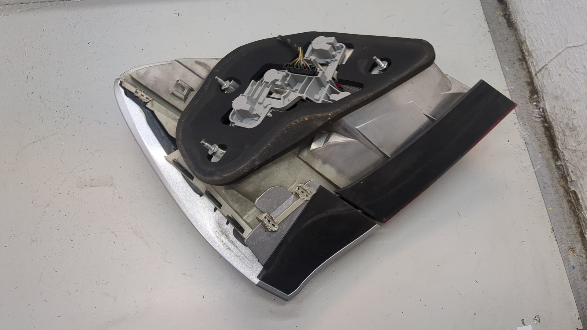 Фонарь задний левый