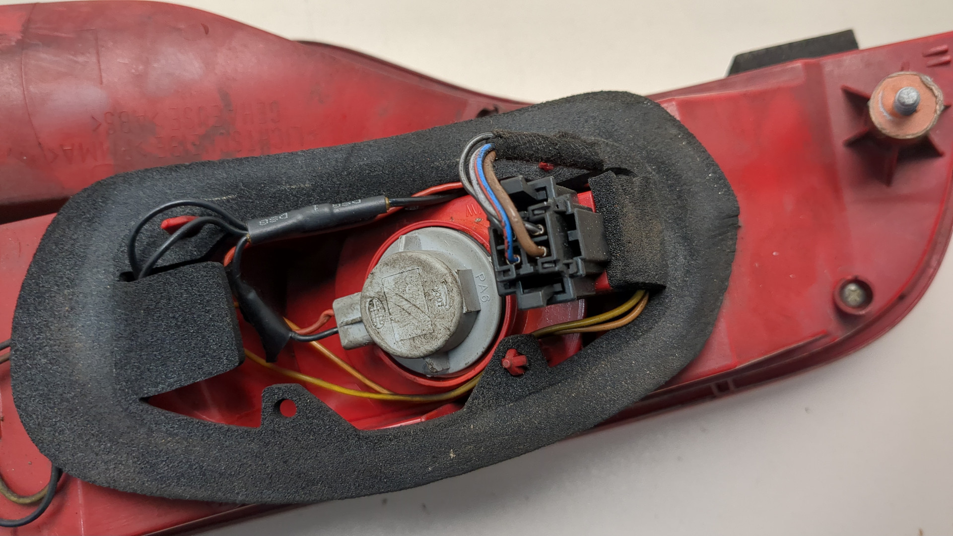 Фонарь задний левый