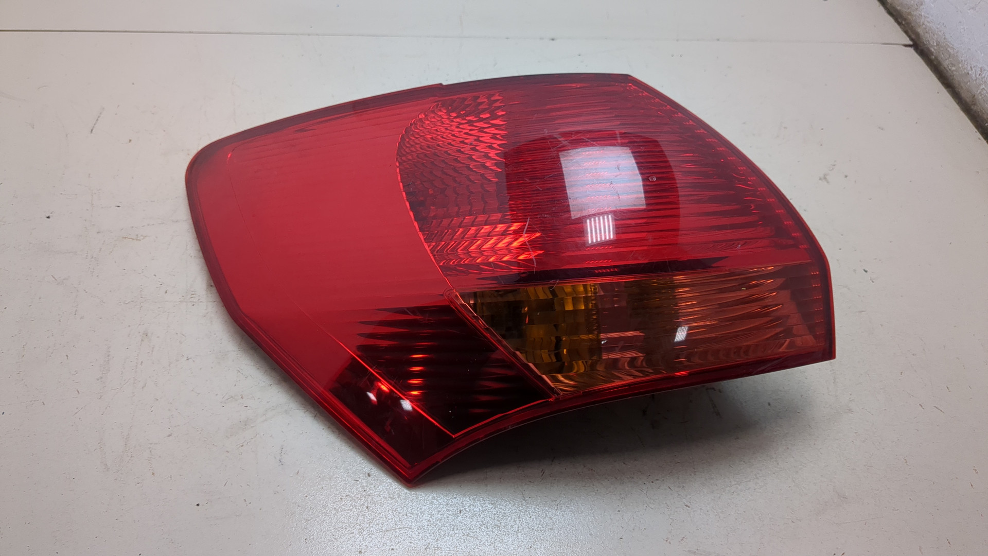 Фонарь задний левый