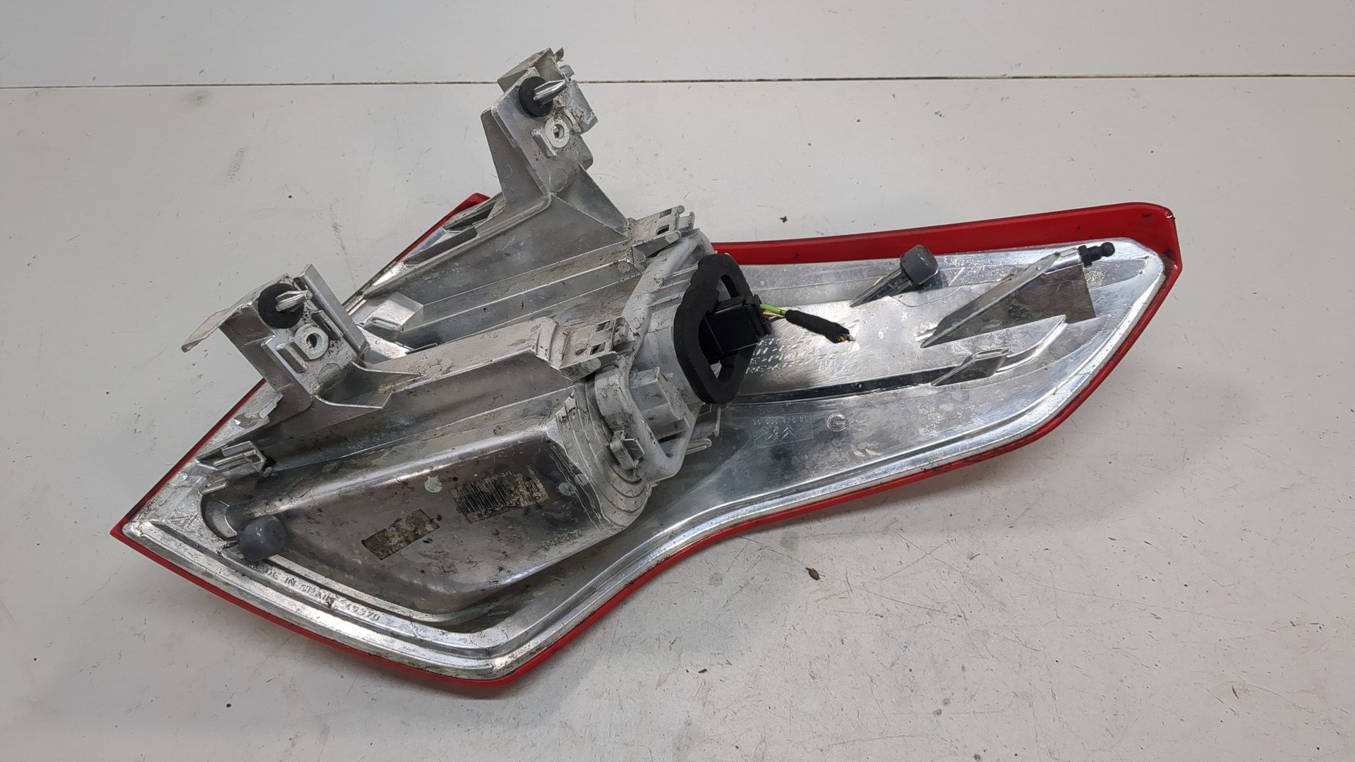 Фонарь задний левый