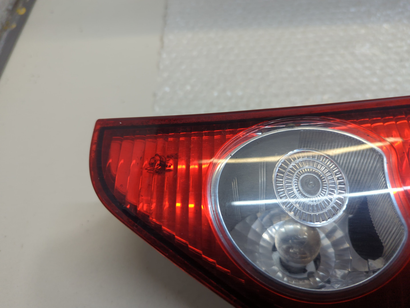 Фонарь задний левый