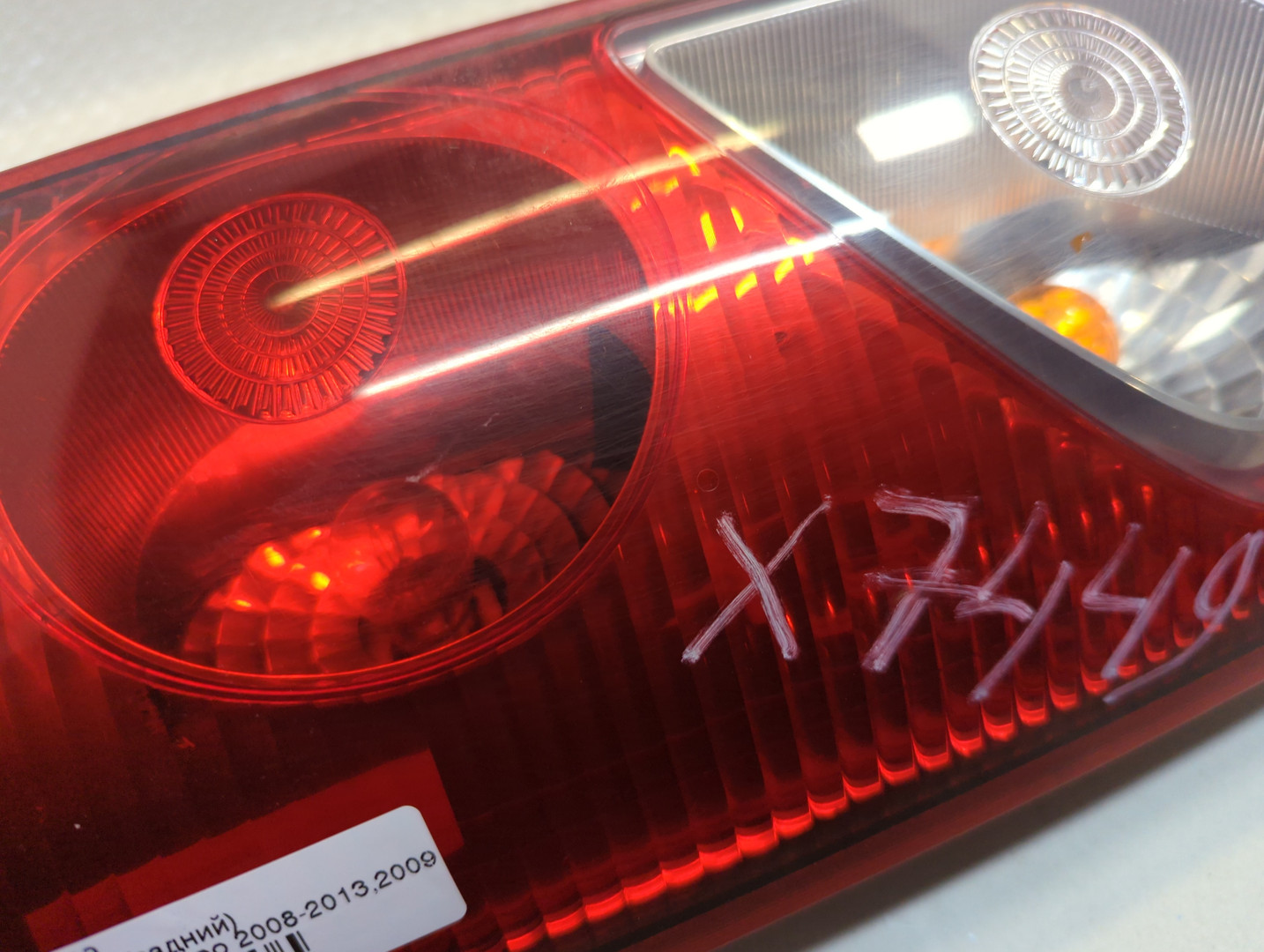 Фонарь задний левый