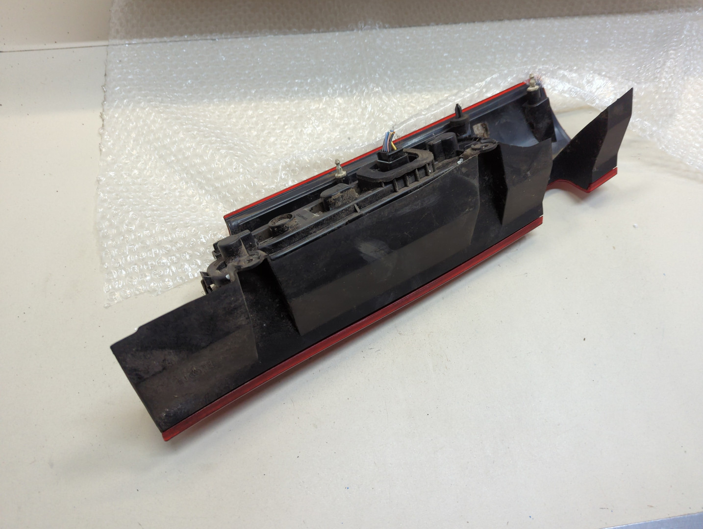 Фонарь задний левый