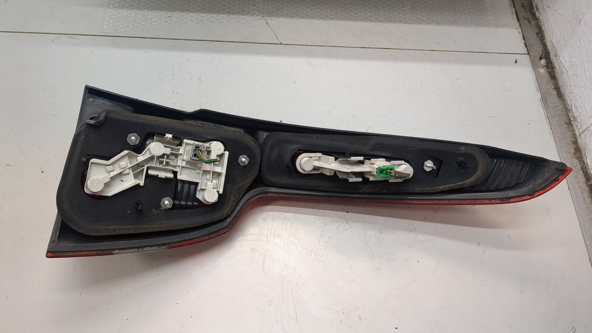 Фонарь задний левый