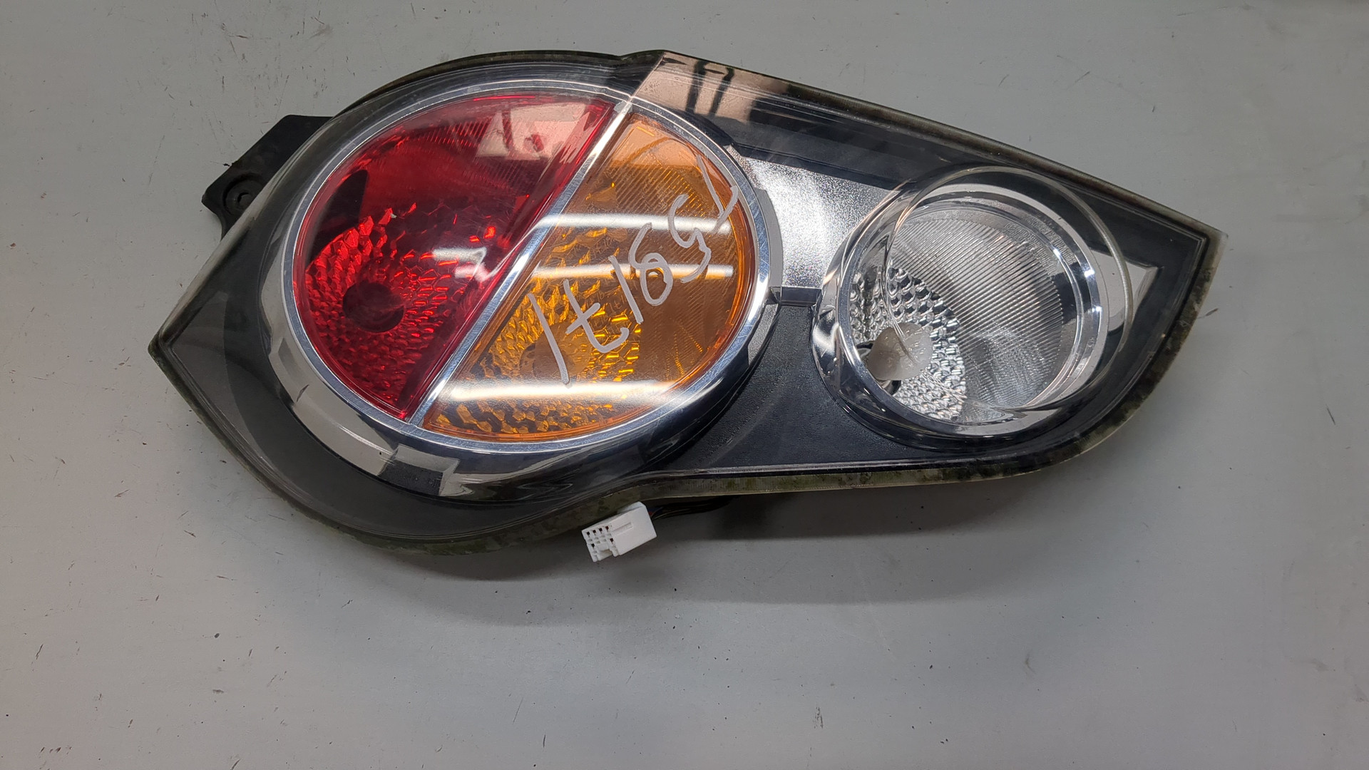 Фонарь задний левый