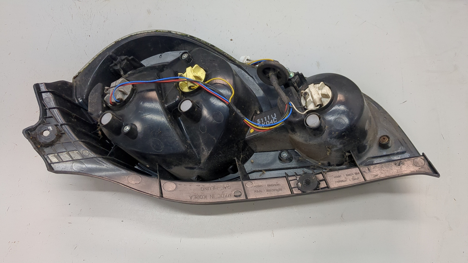 Фонарь задний левый