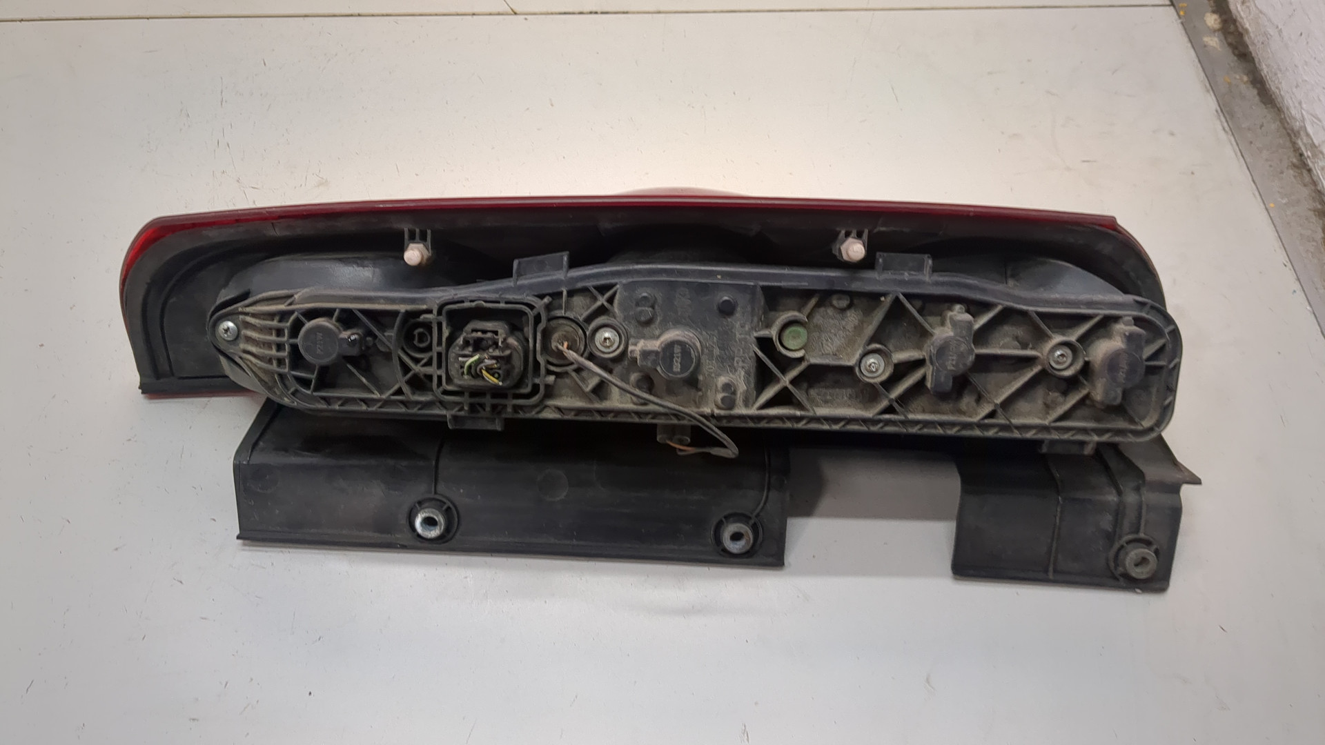 Фонарь задний левый