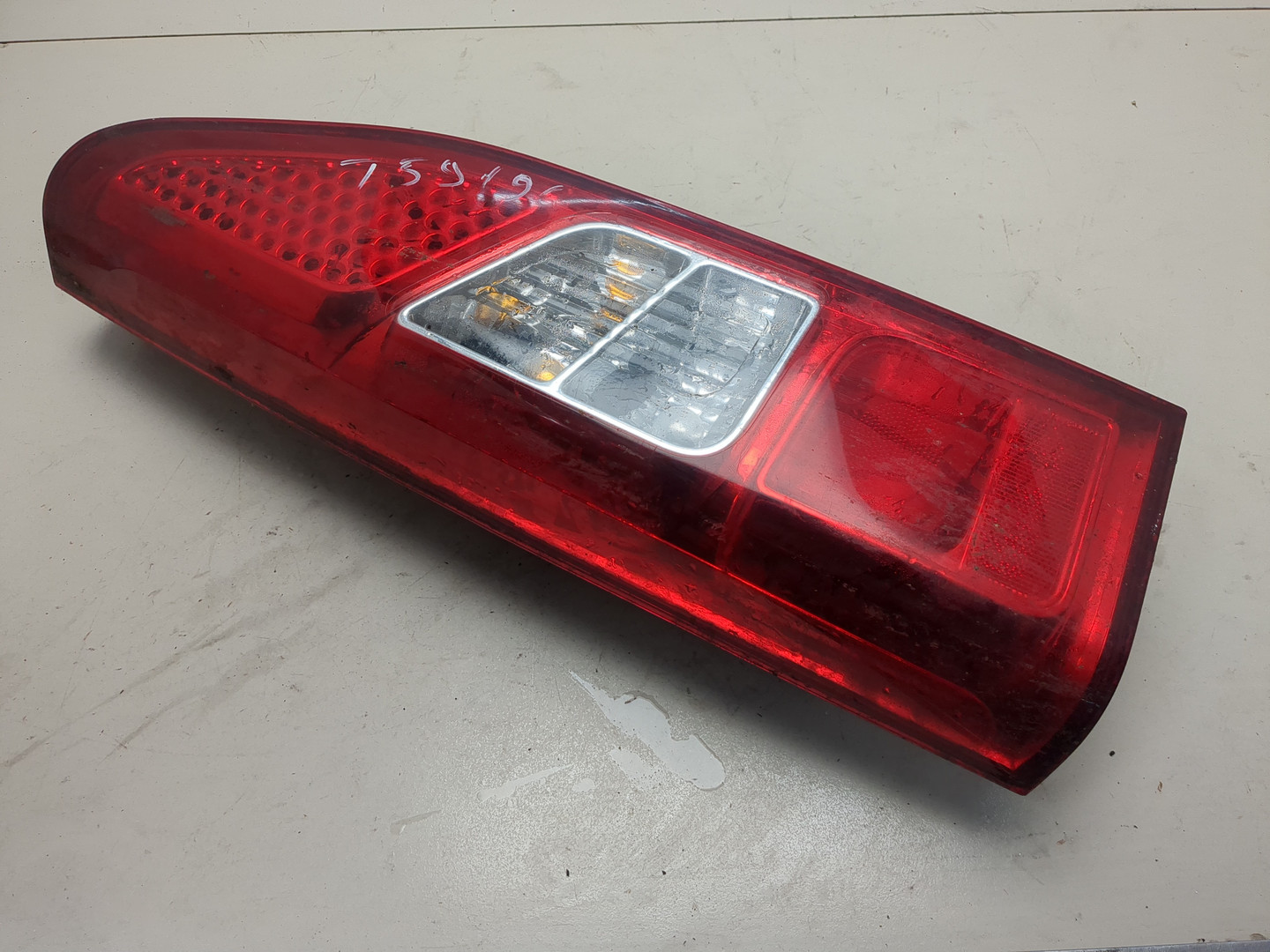 Фонарь задний левый