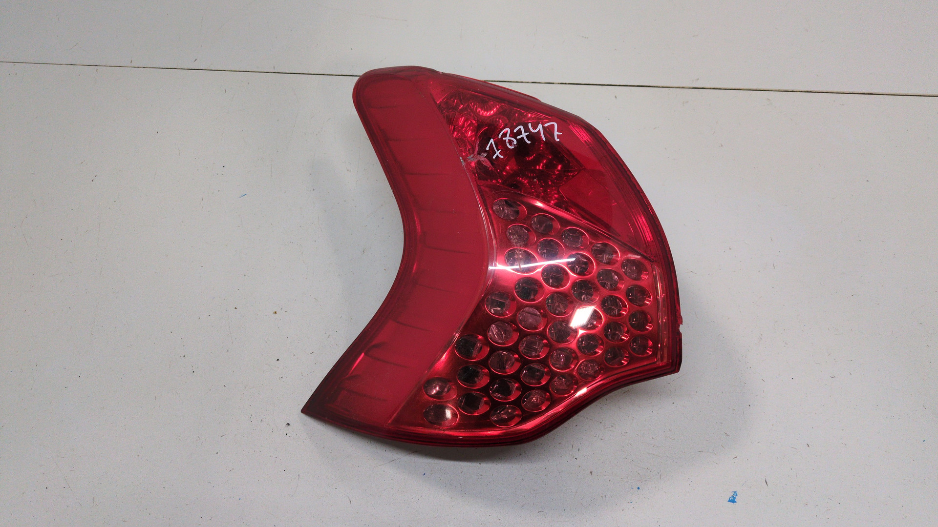 Фонарь задний левый