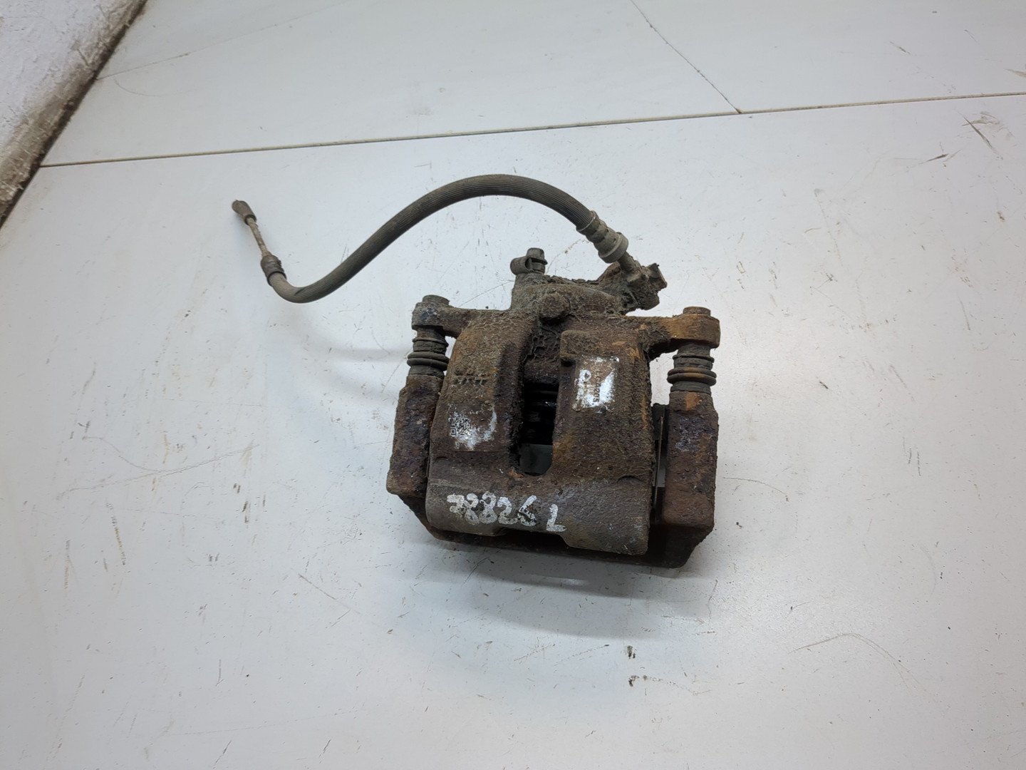 Суппорт задний левый