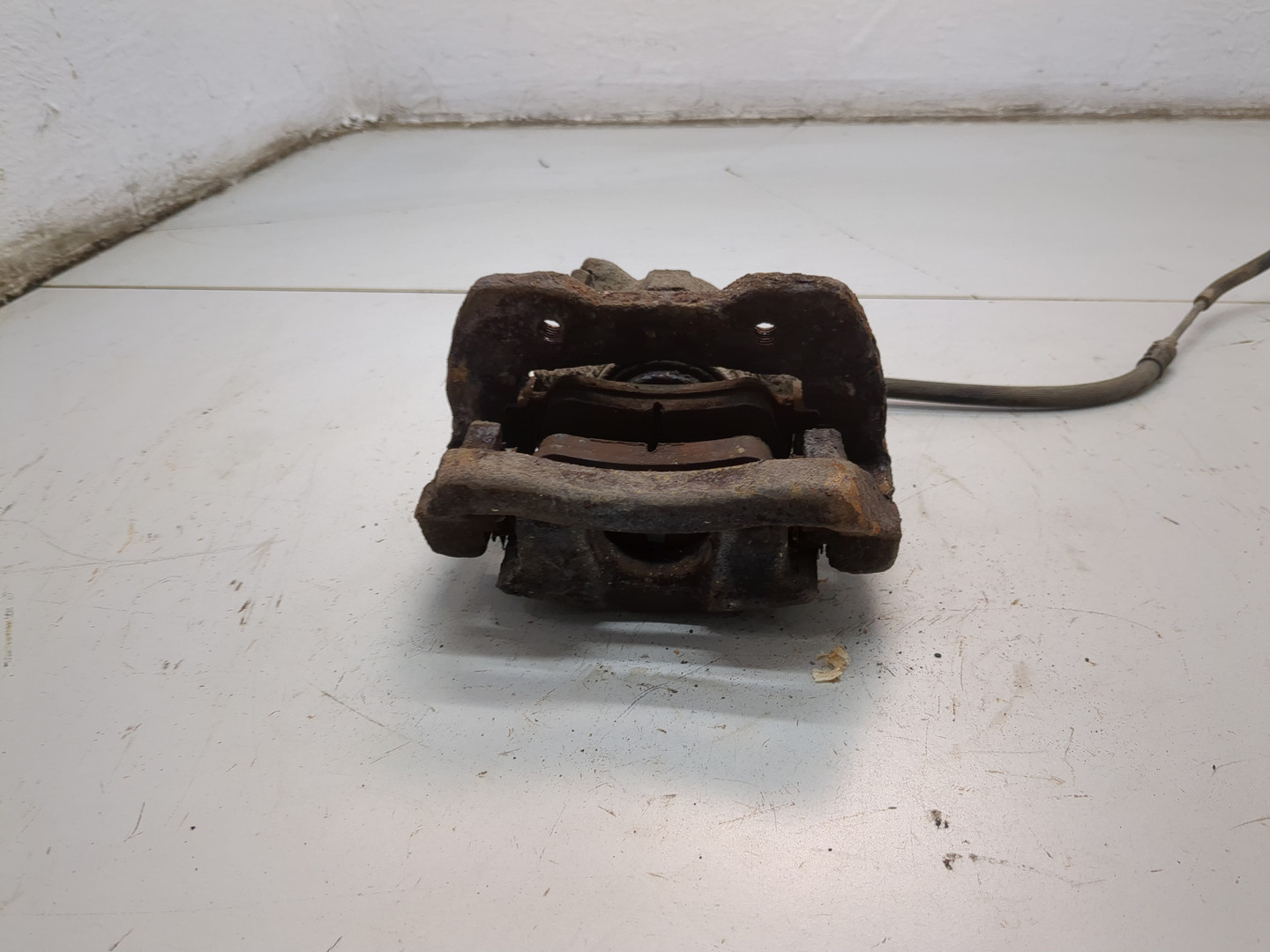 Суппорт задний левый