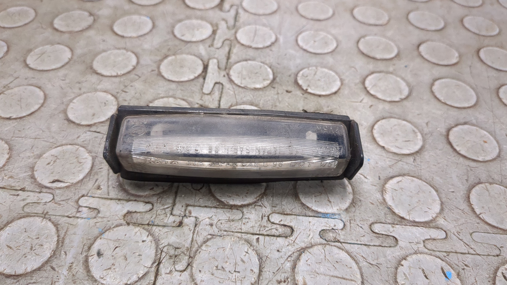 Фонарь подсветки номера