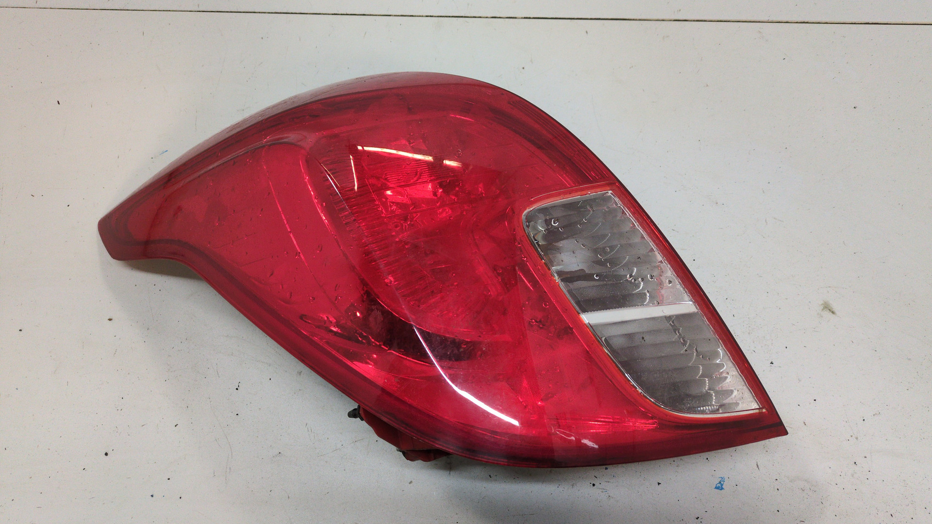 Фонарь задний левый